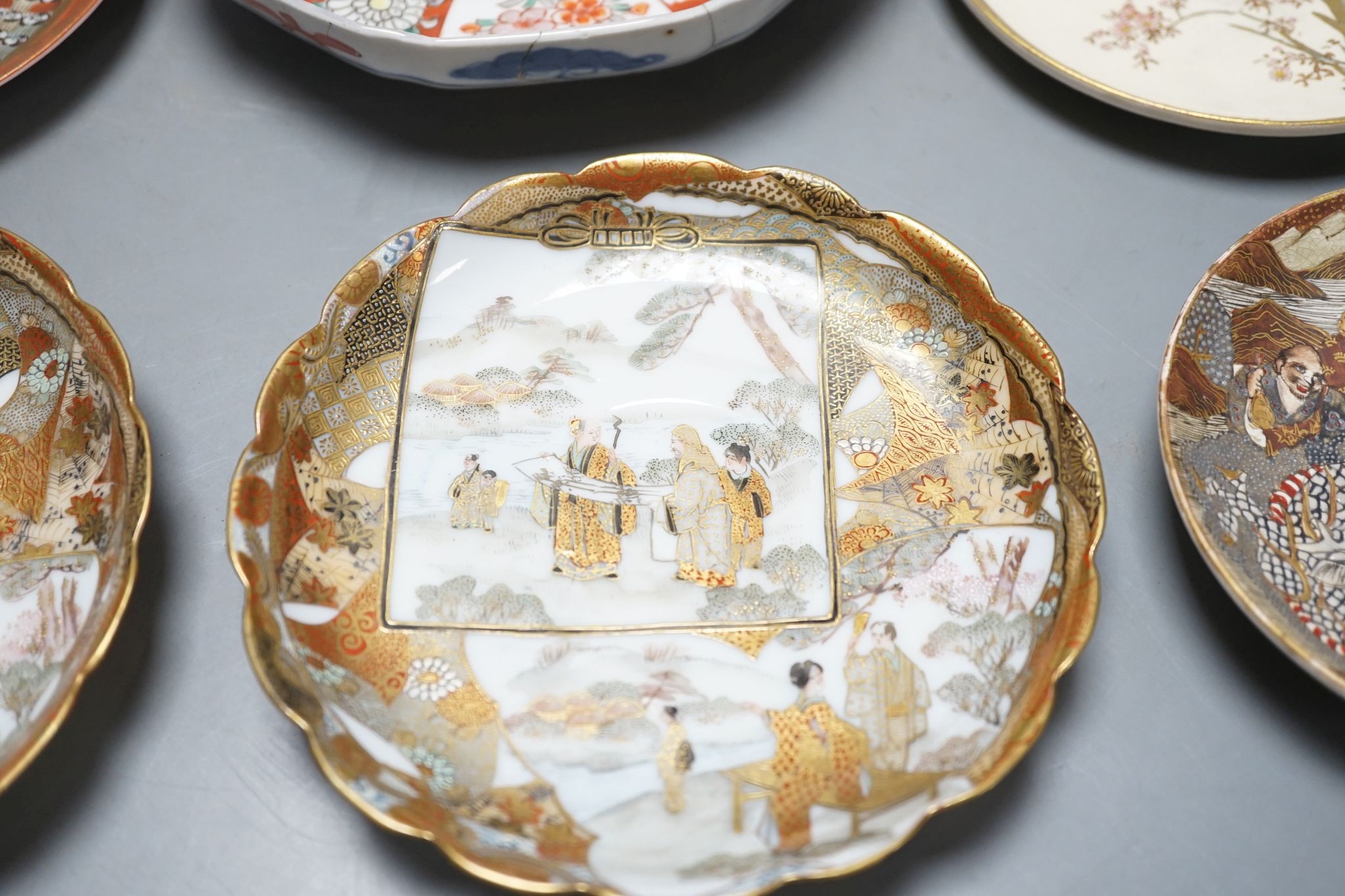 Two Japanese Satsuma pottery saucers, three Kutani saucers, and Imari dish and a Japanese cloisonné enamel koro and cover